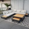 Luxus-Gartenlounge mit zwei Sofamodulen und integriertem Seitentisch.