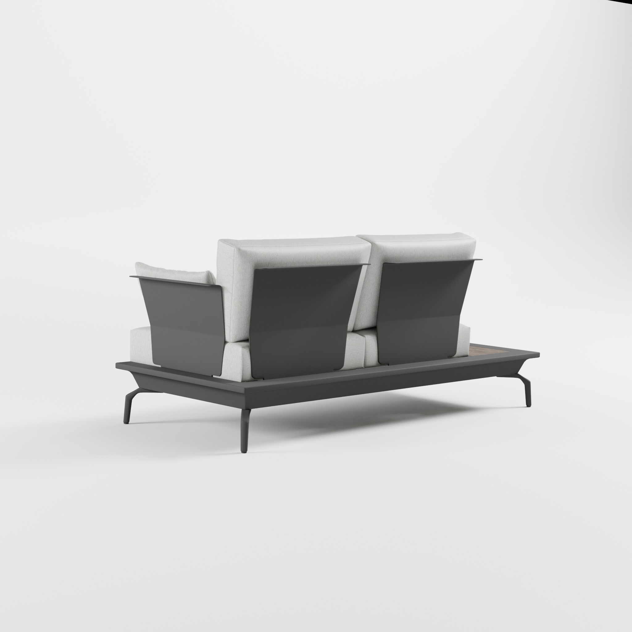 Rückansicht eines anthrazitfarbenen Outdoor‑Lounge‑Sofas aus Aluminium mit Edelstahl‑Rückenlehne, seitlicher Armlehne, Keramik‑Seitentisch und Delta‑Füßen, ICM.