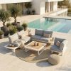 Cannes Outdoor-Lounge Set – Offene Anordnung in Weiß Modulare Cannes Outdoor-Lounge Kombination aus zwei 2-Sitzer Modulen mit integriertem Tisch, Kaffeetisch, Eckmodul als Sessel gegenüber und Loungetisch in der Mitte, weißes Aluminium mit Teak-Tischplatten auf Terrasse vor Haus mit Pool