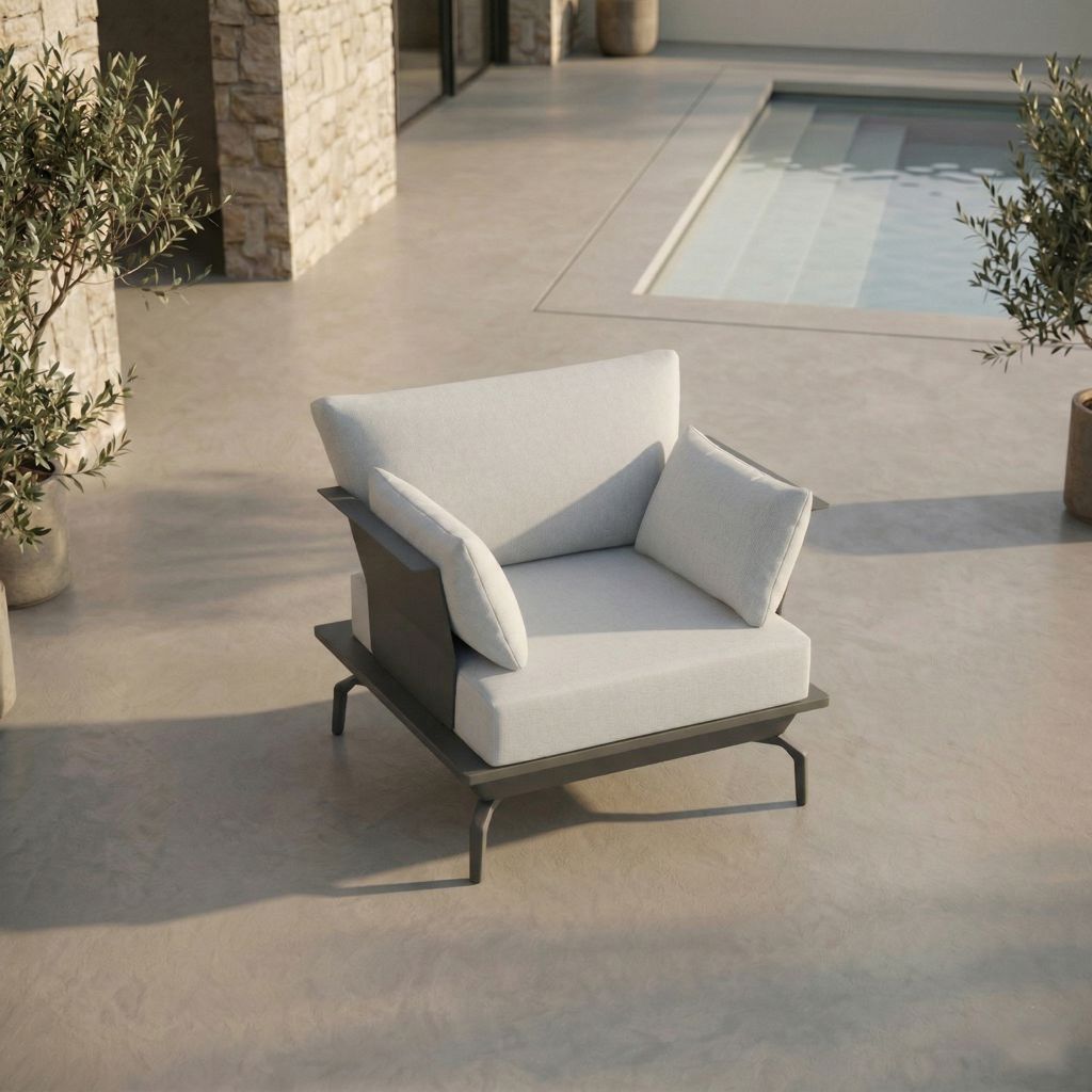ICM Gartenlounge Monaco Outdoor-Sessel aus weißem Aluminium mit anthrazitfarbenen Polstern auf moderner Terrasse im zeitgemäßen Outdoor-Wohnbereich