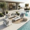 Monaco Gartenlounge Set aus 3-Sitzer und zwei Sesseln mit Loungetisch in der Mitte, weißes Aluminium, als offene Loungegruppe auf Terrasse vor Haus mit Pool