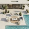 Drohnenansicht des Monaco Gartenlounge Sets aus 3-Sitzer und zwei Sesseln mit Loungetisch in der Mitte, weißes Aluminium, offene Anordnung auf Terrasse vor Haus mit Pool